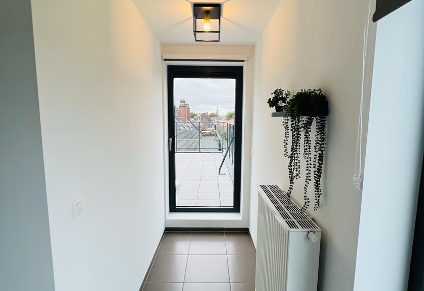 Te koop – Uniek penthouse met uitzonderlijk terras in hartje Kortrijk