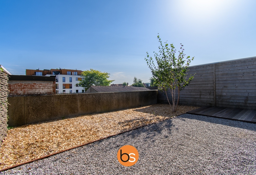 Gelijkvloers appartement met tuin